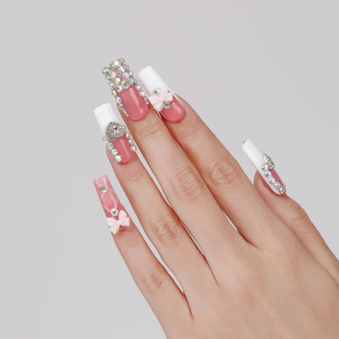 Heart Bow square press-on nails hand close-up