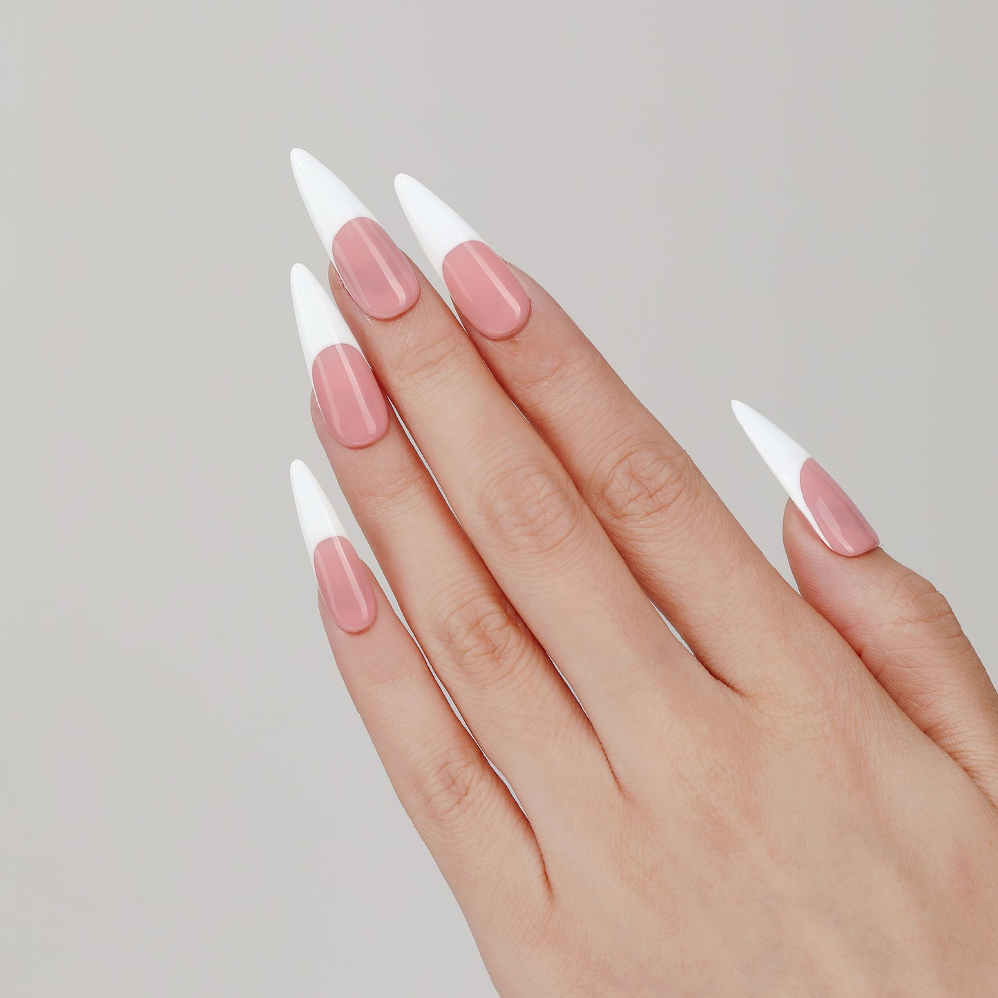 Clean Classic stiletto press-on nails worn on hand