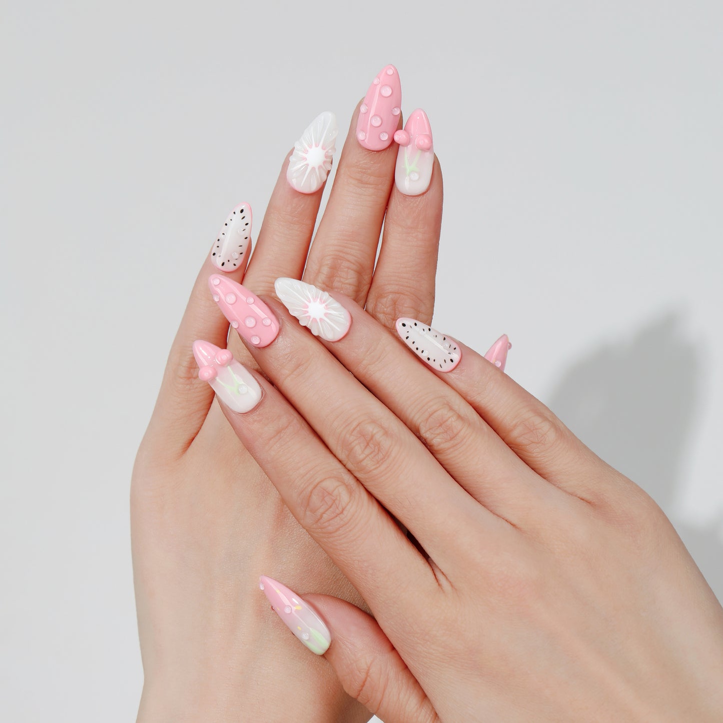 Berry Picnic almond press-on nails worn on hand