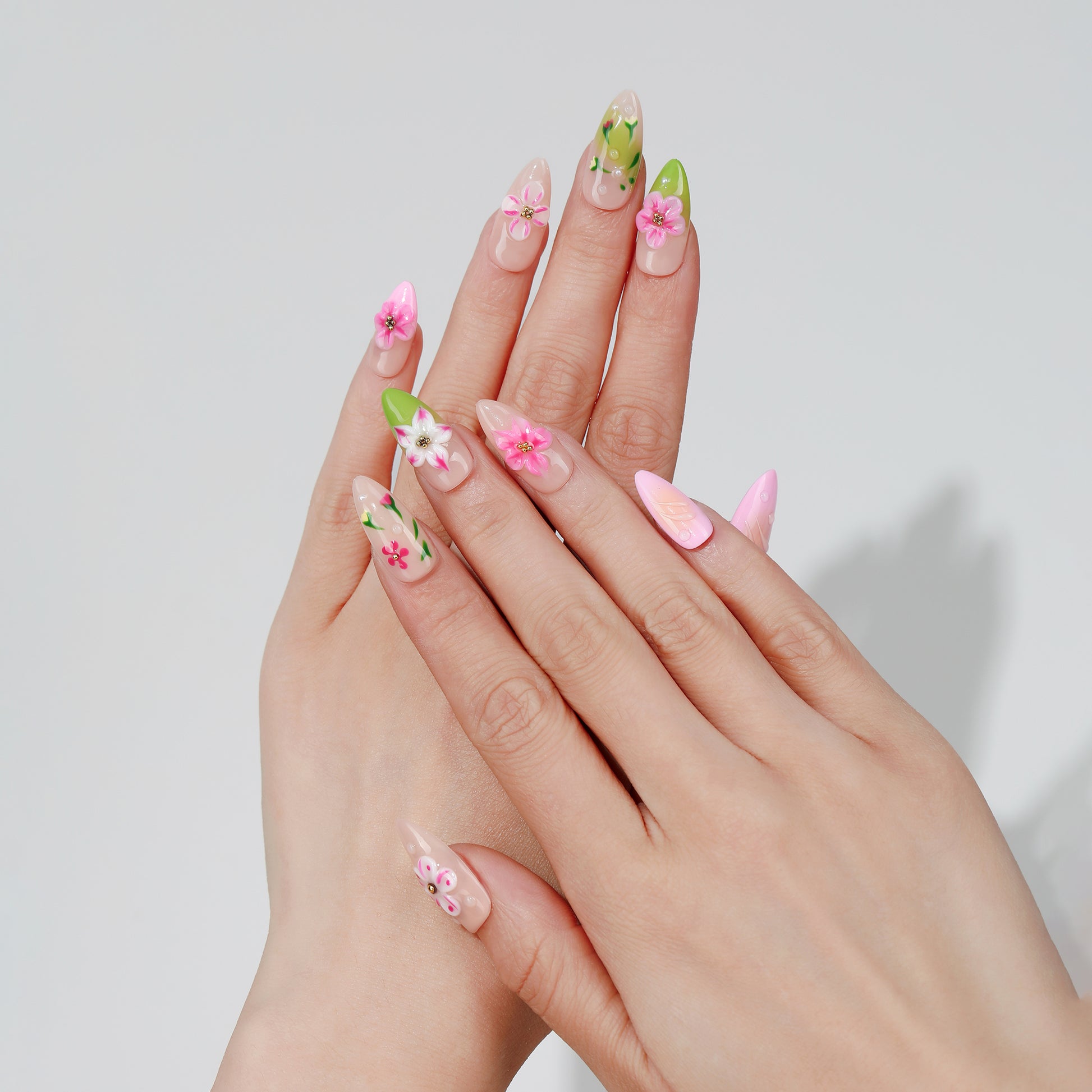 Spring Bouquet almond press-on nails worn on hand