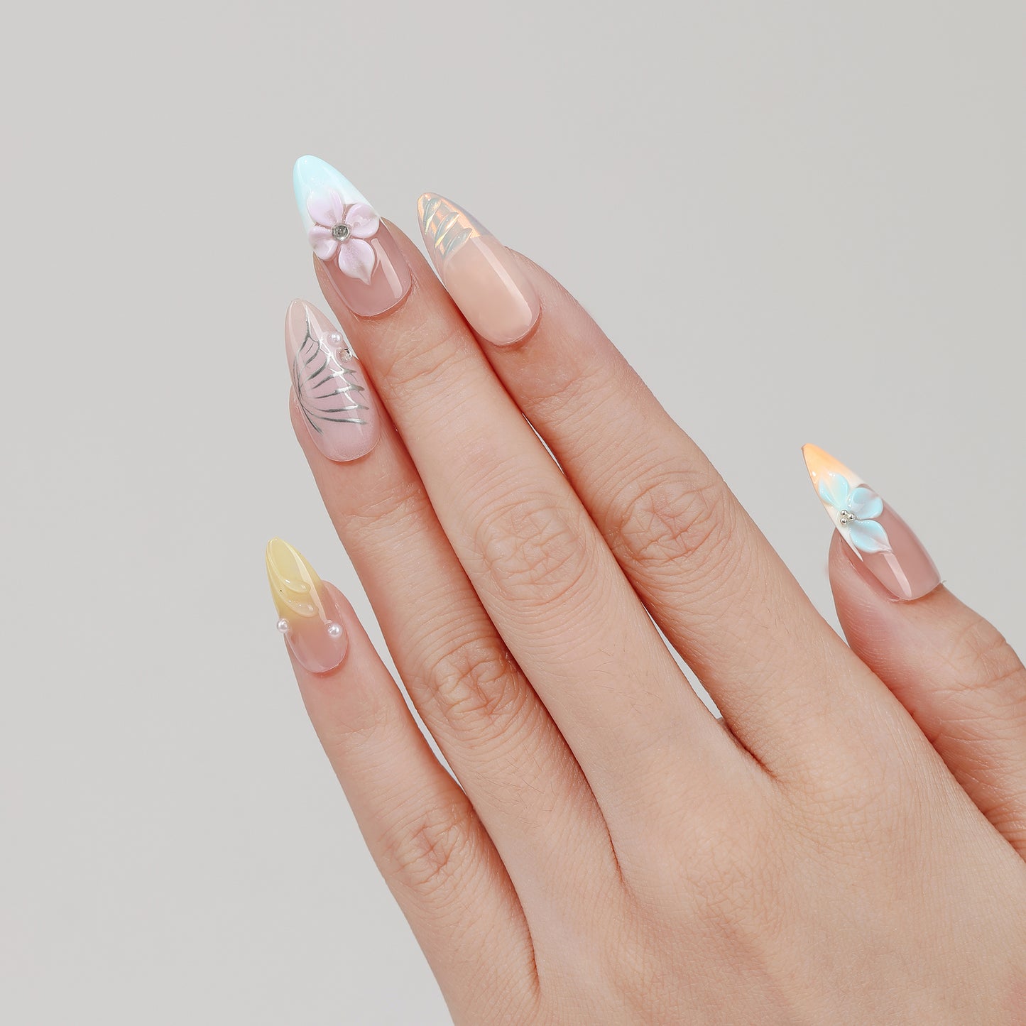 Pastel Garden almond press-on nails worn on hand