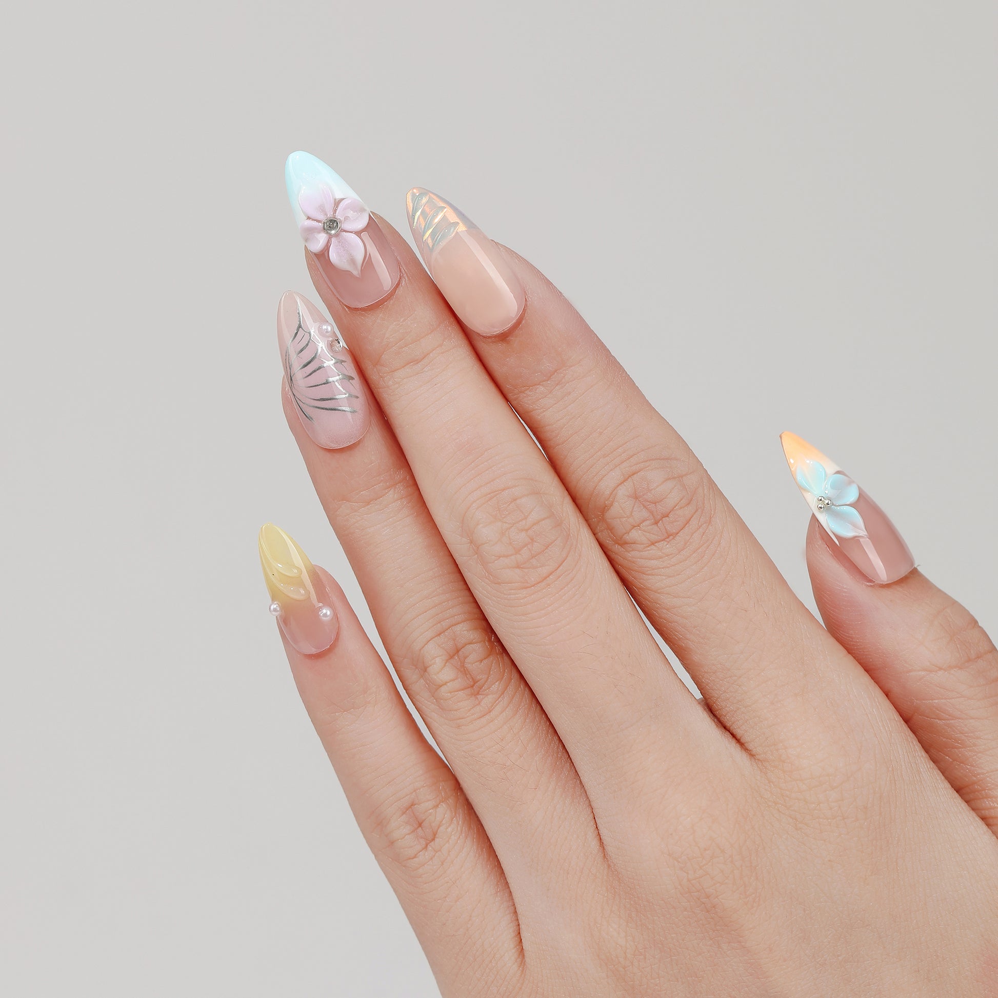 Pastel Garden almond press-on nails worn on hand
