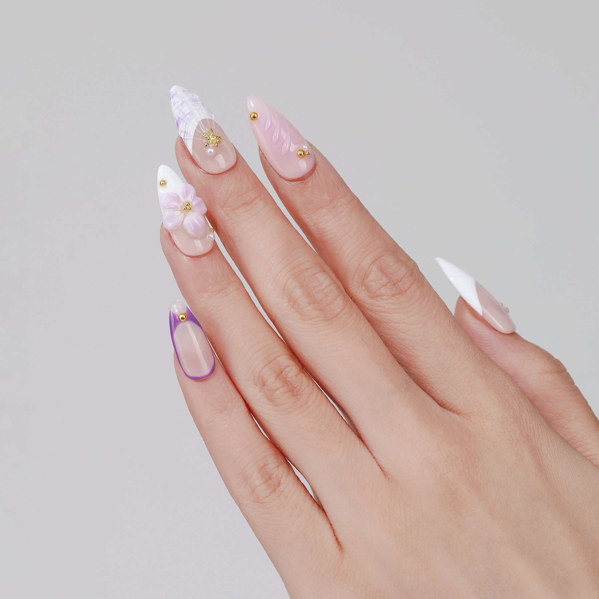 Lilac Trace almond press-on nails worn on hand