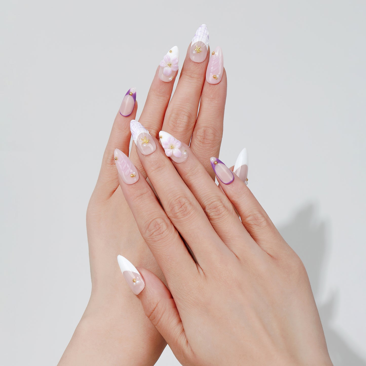 Lilac Trace almond press-on nails hand close-up