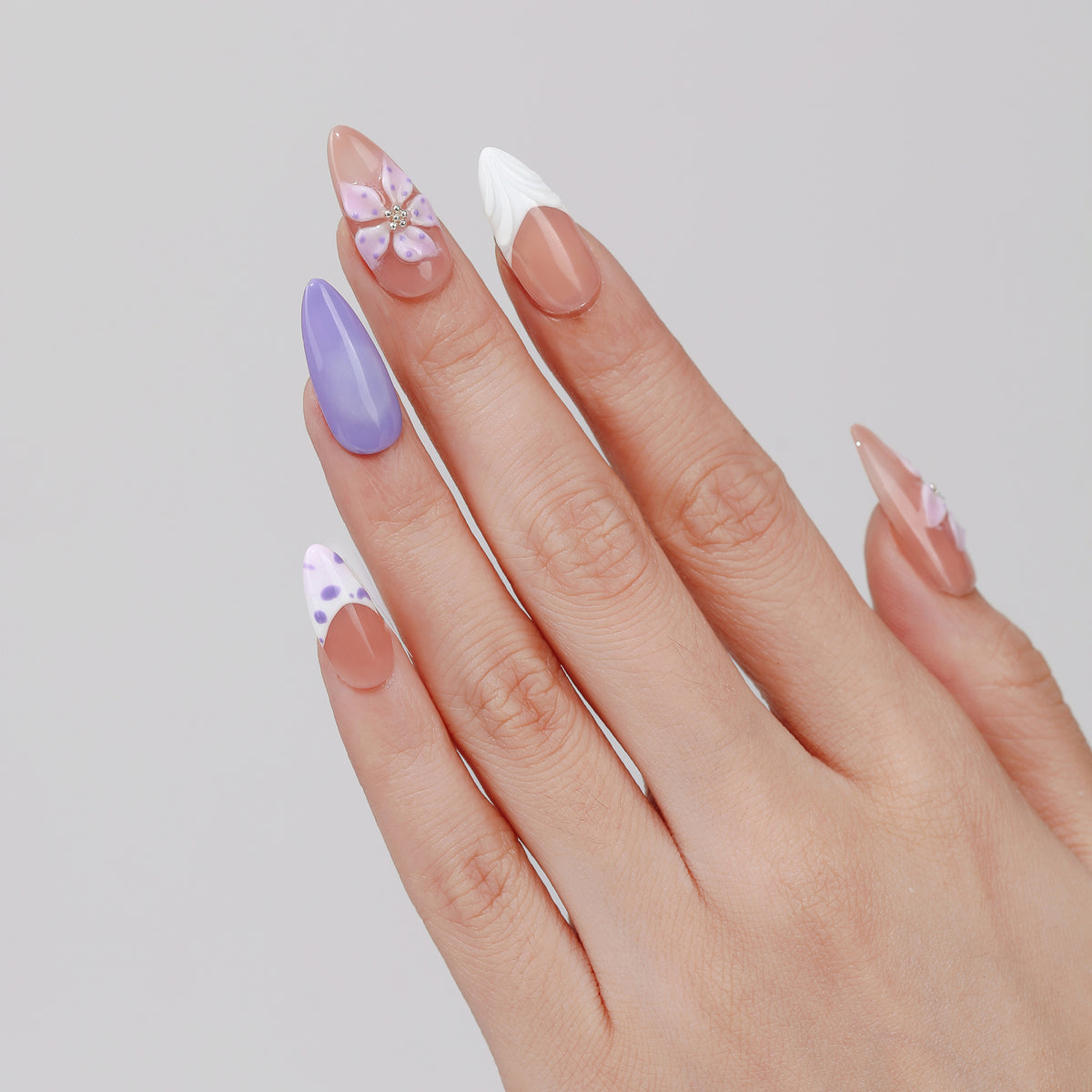 Lavender Vine almond press-on nails worn on hand