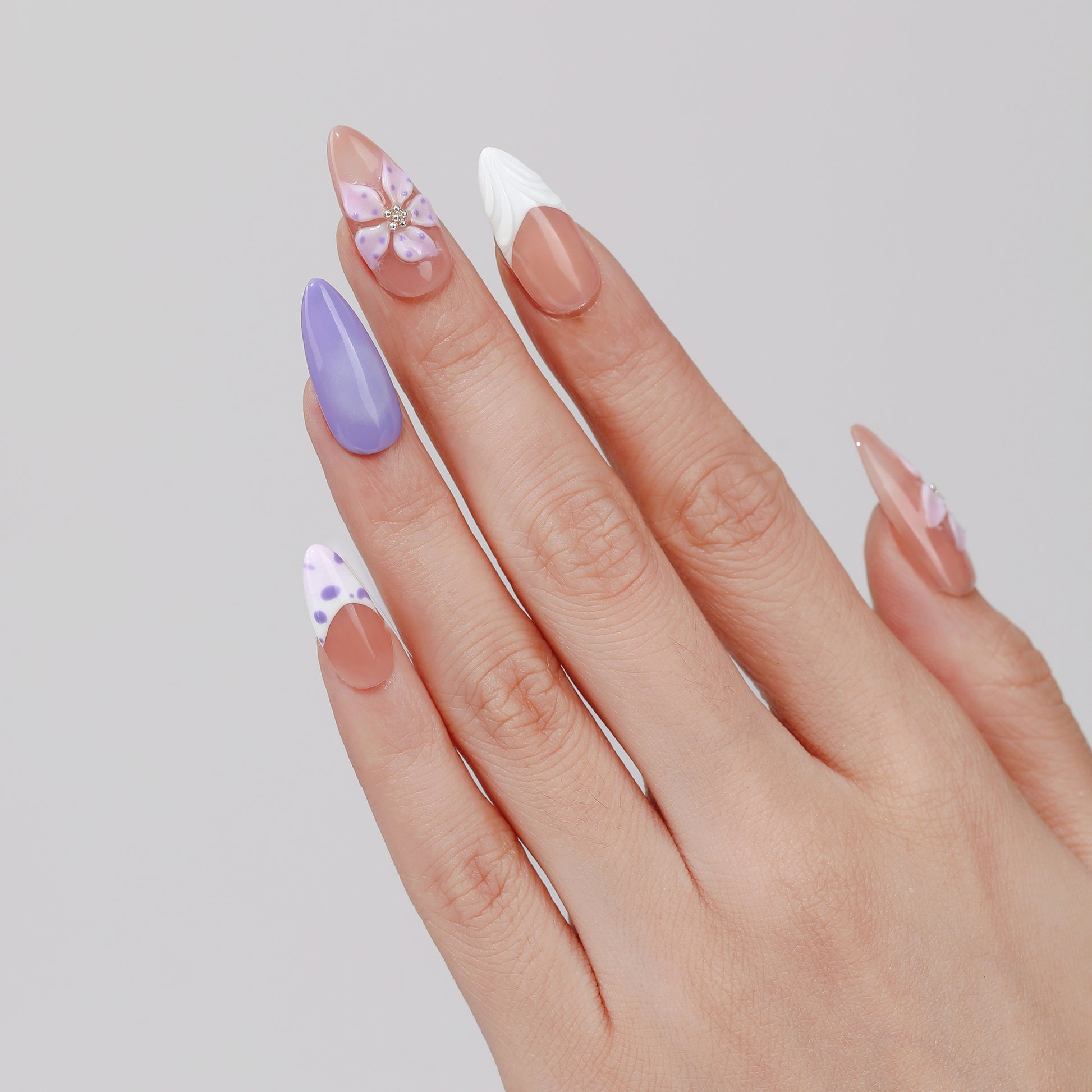 Lavender Vine almond press-on nails worn on hand