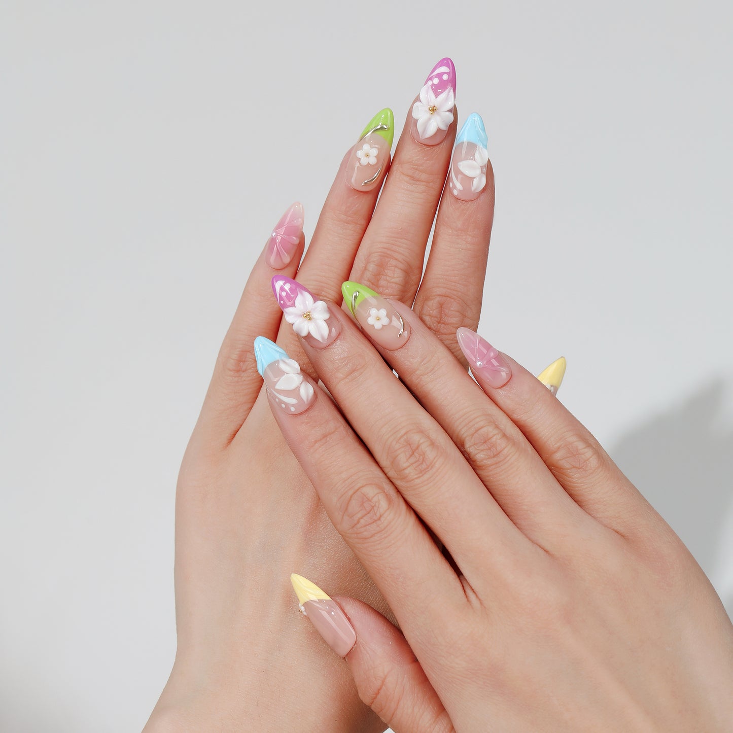 Candy Bloom almond press-on nails worn on hand