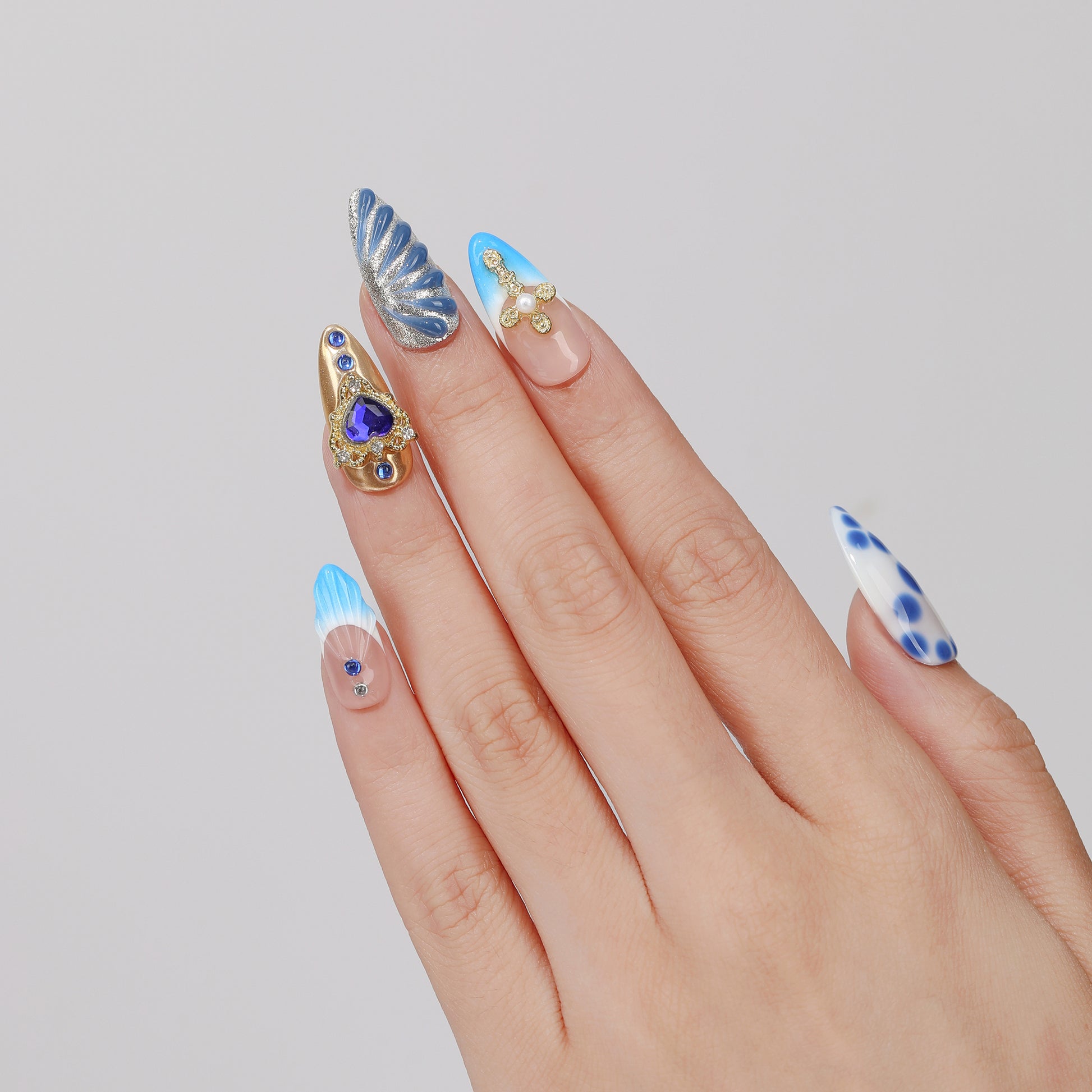 Midnight Heart almond press-on nails hand close-up