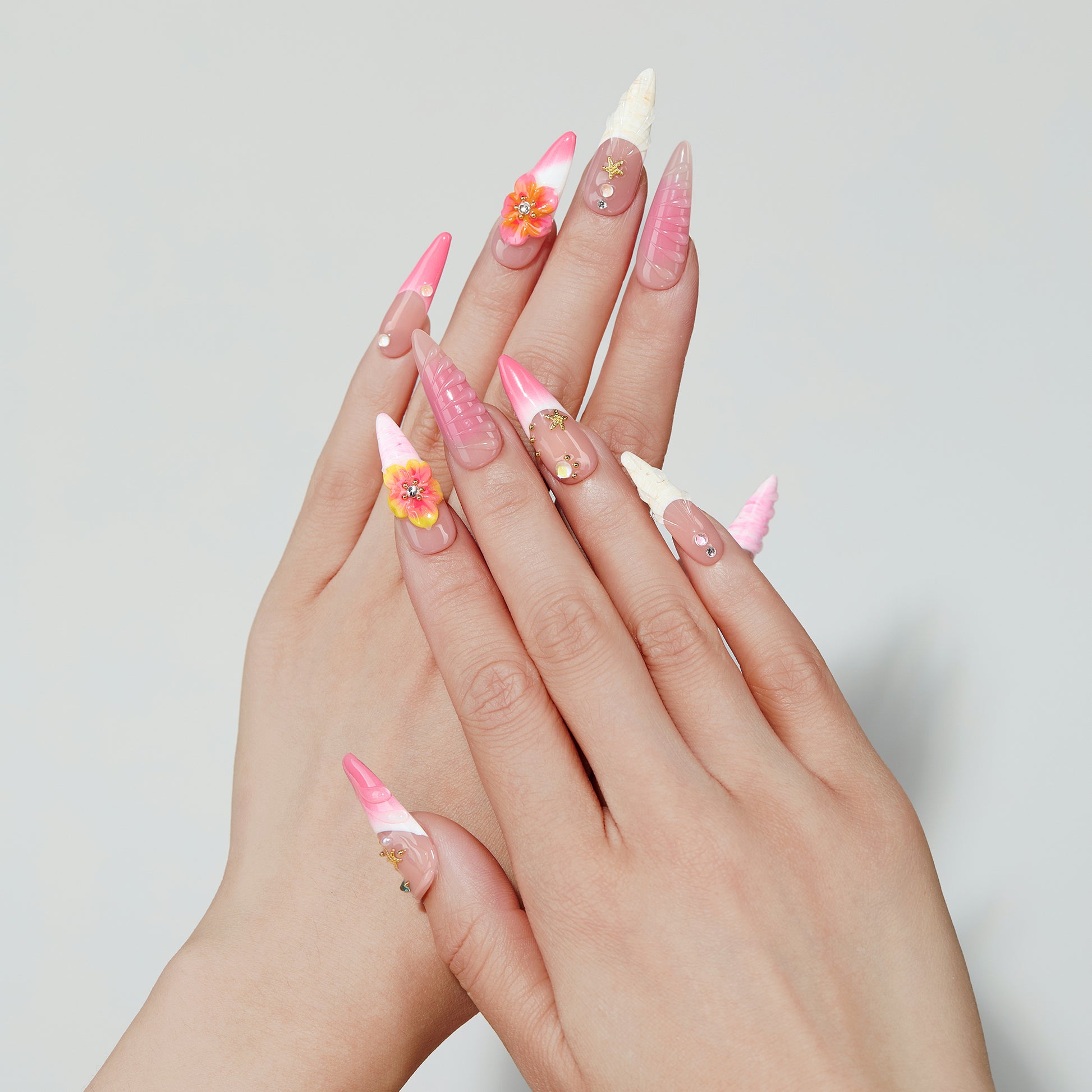 Misty Garden long almond press-on nails worn on hand