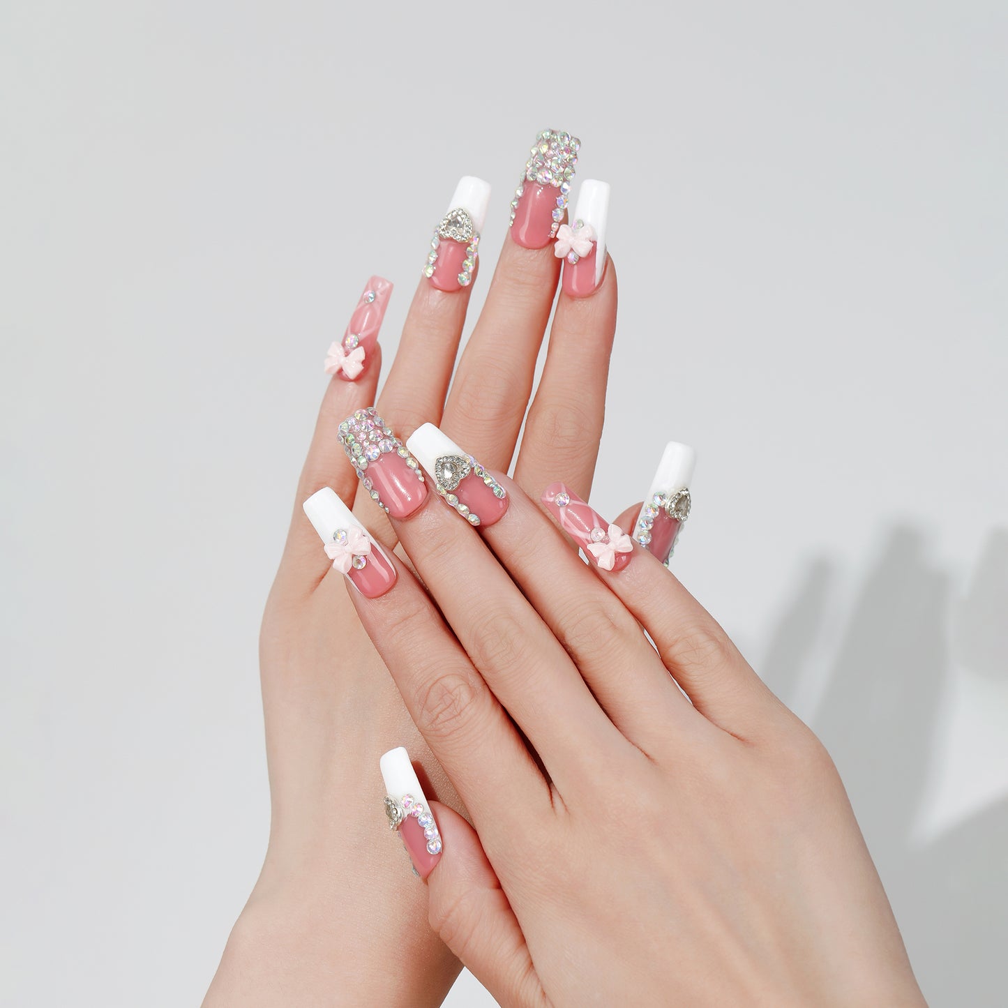Heart Bow square press-on nails worn on hand