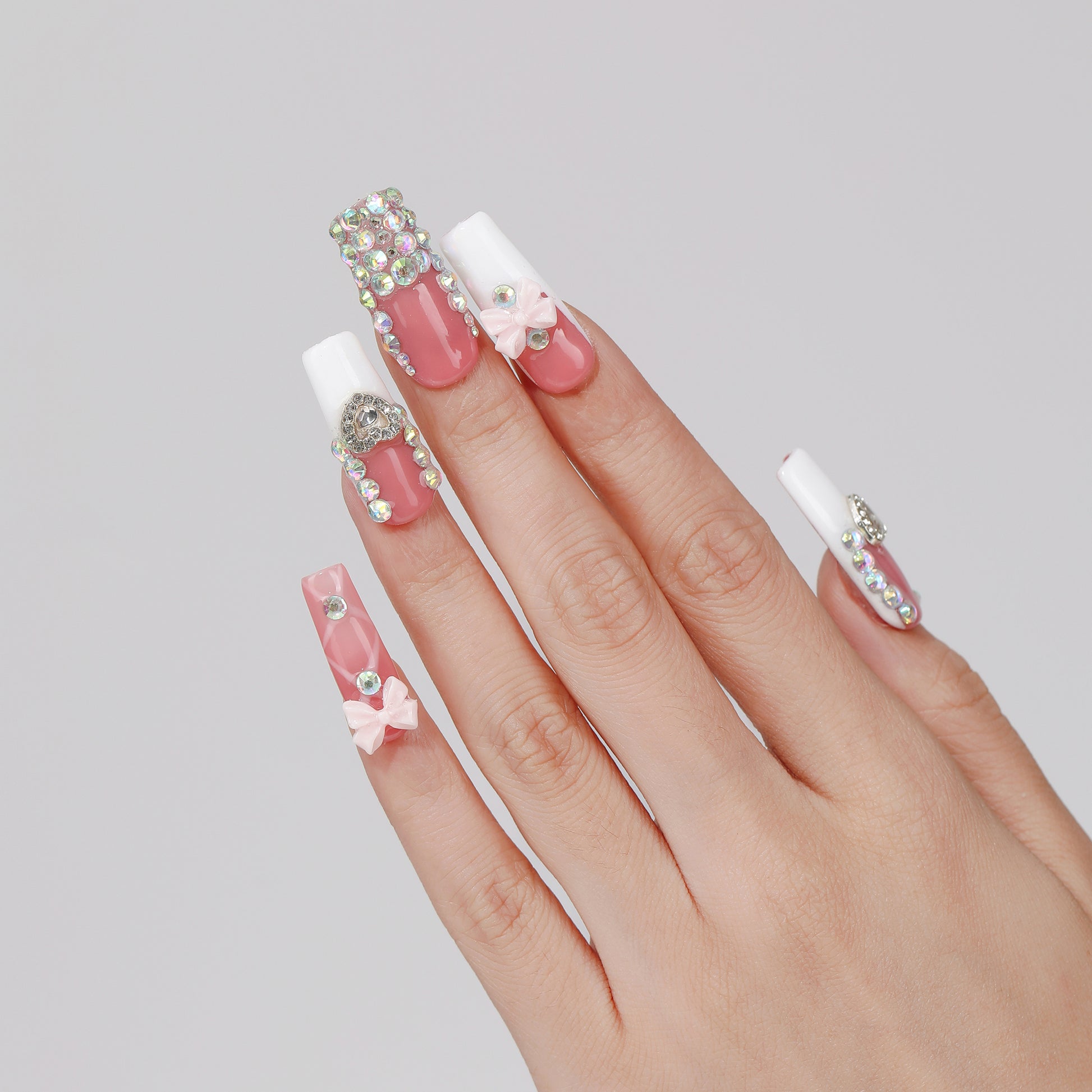 Heart Bow square press-on nails hand close-up