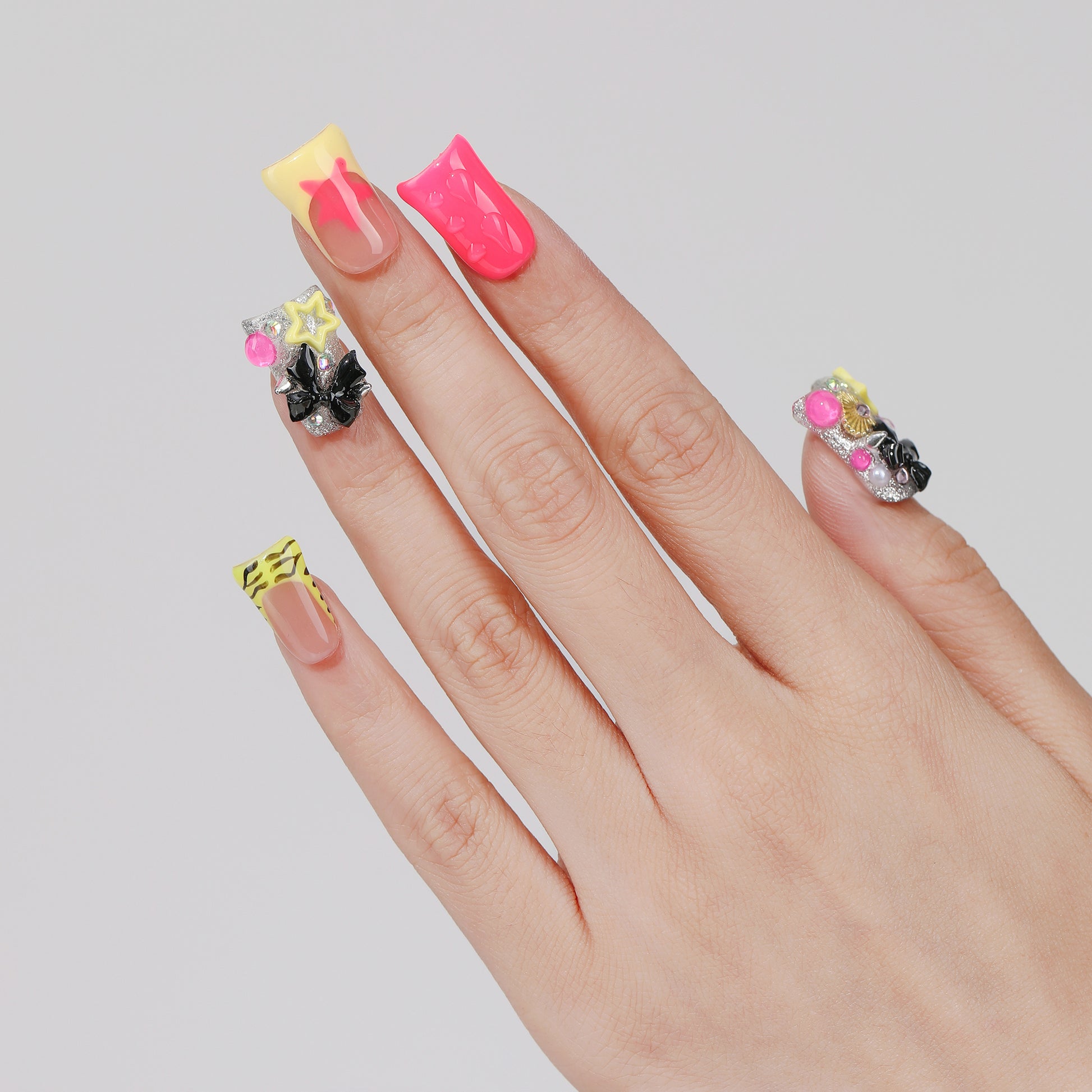 Starry Bow coffin press-on nails hand close-up