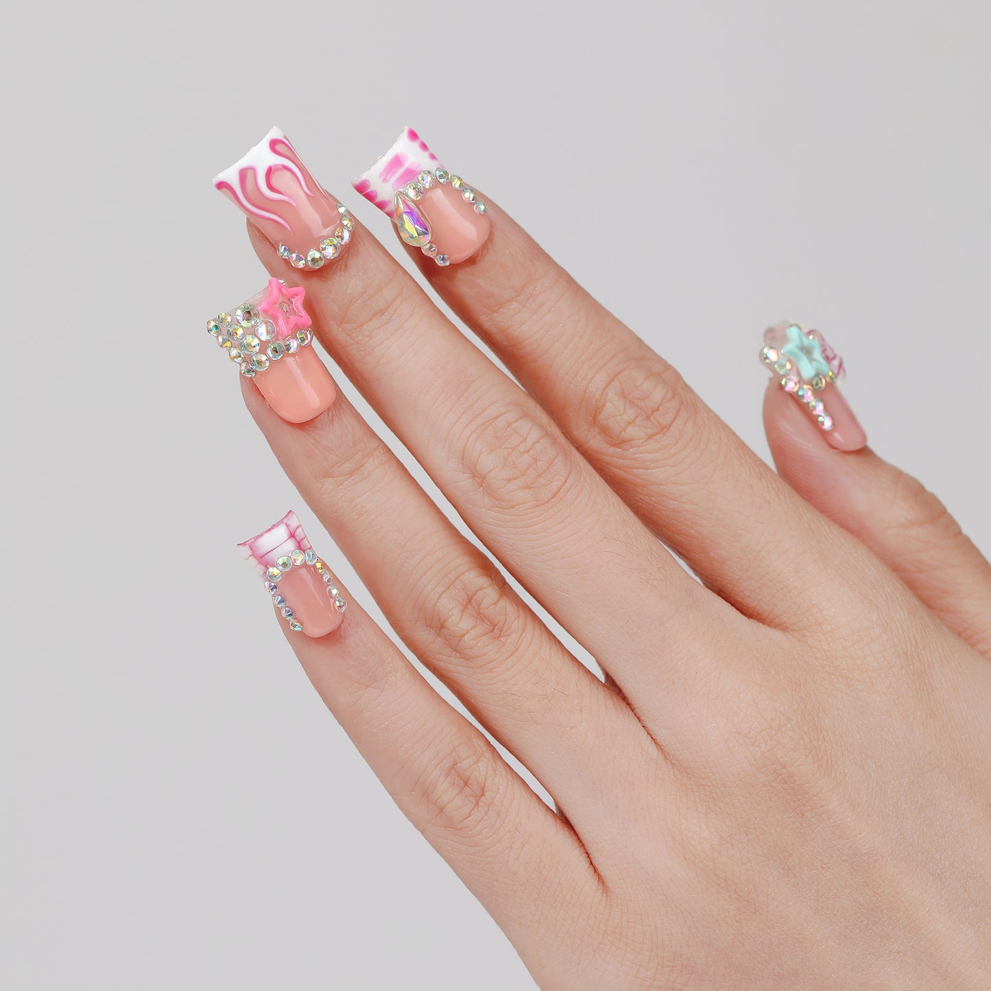 Flame Spark coffin press-on nails worn on hand
