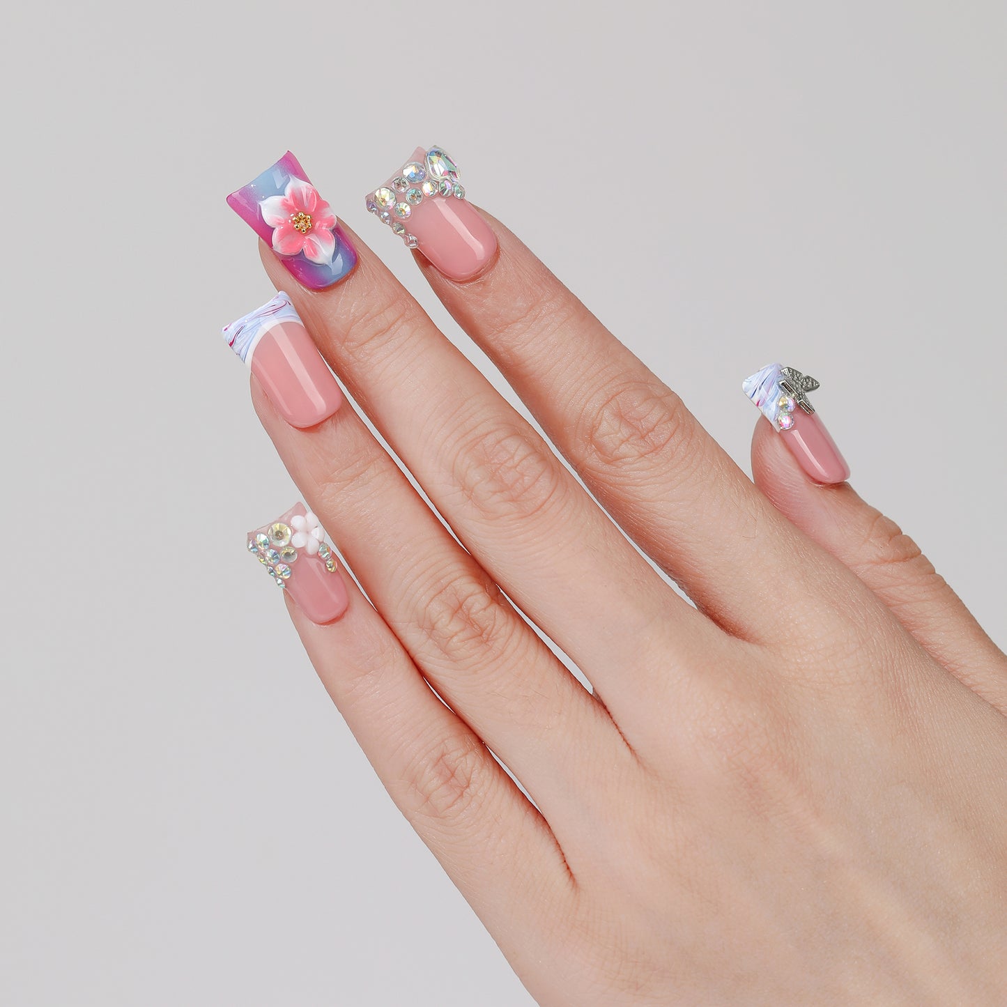 Flutter Dream coffin press-on nails worn on hand
