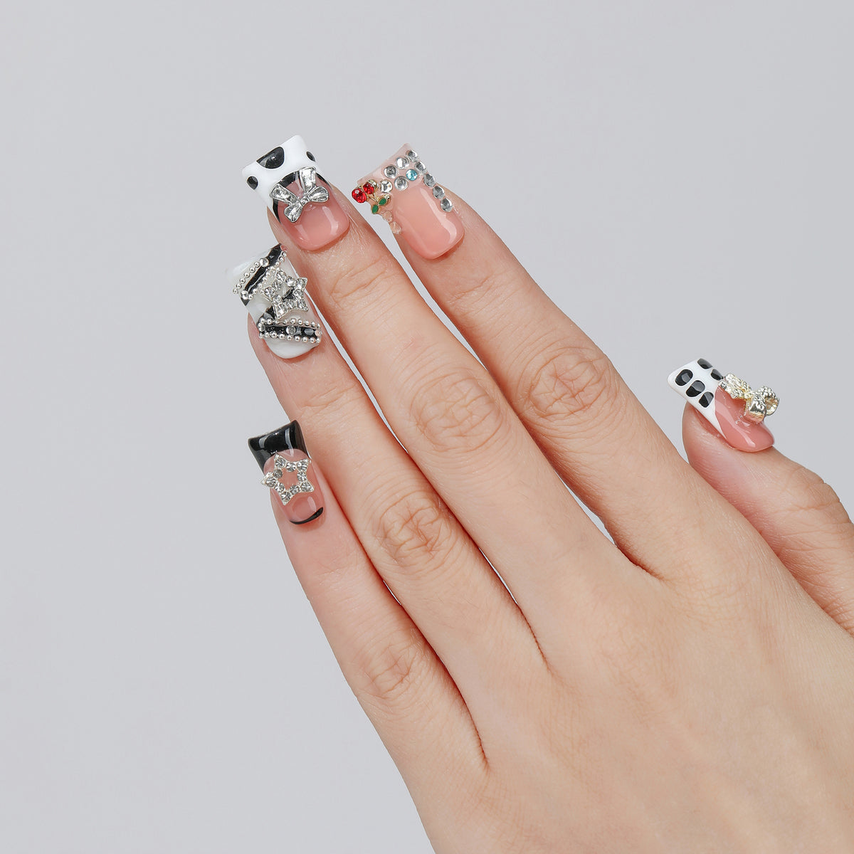 Cherry Ribbon coffin press-on nails hand close-up