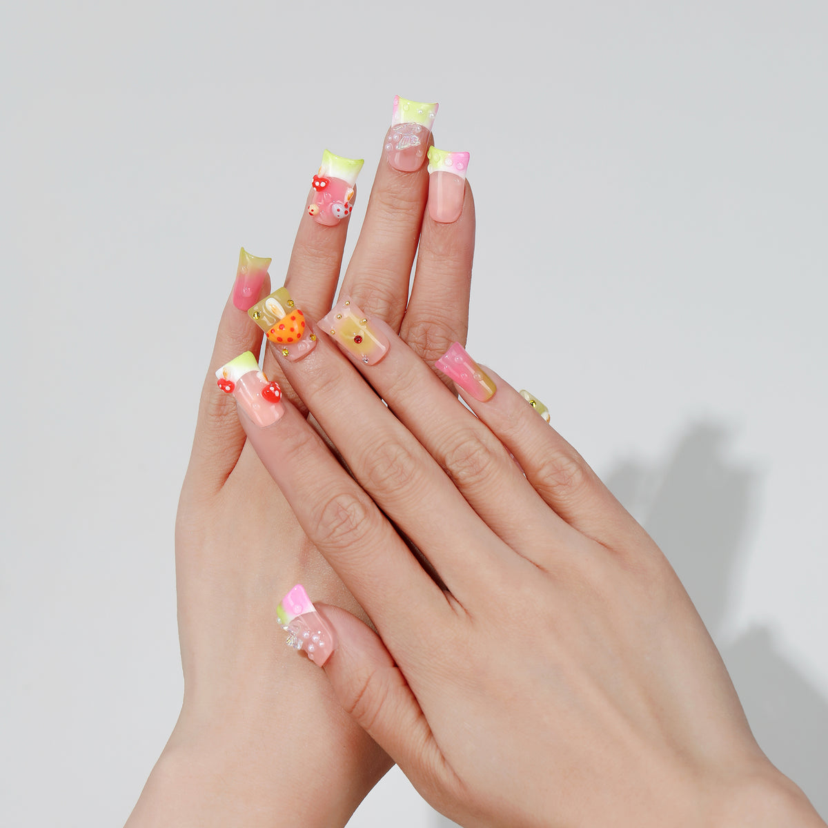 Mushroom Magic coffin press-on nails worn on hand