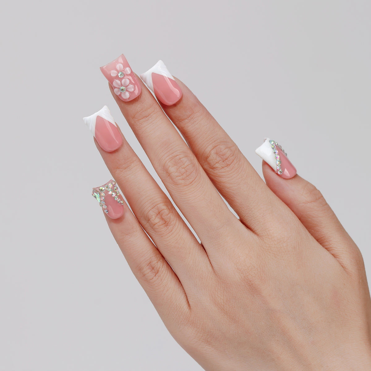 V-Tip Flora coffin press-on nails hand close-up