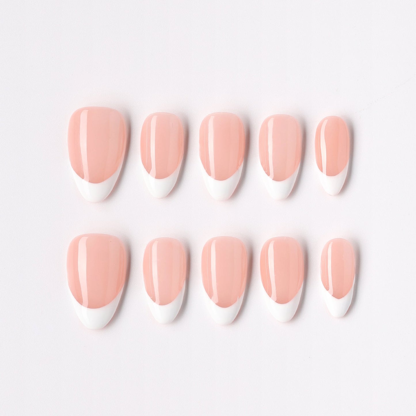 Whisper Tip press-on nails – soft nude French tip short almond full set